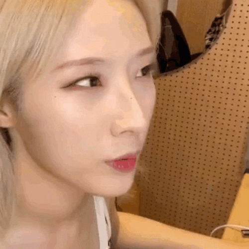 Haseul  Focused Squint Look GIF
