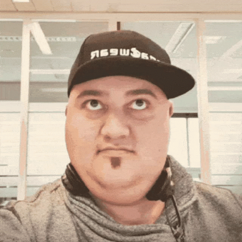 Hat Trick Head Turn Around Cap GIF