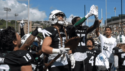 Hawaiian Football Players Celebrating