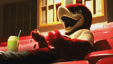 Hawk Mascot Eating Popcorn GIF