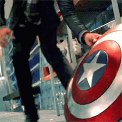 Hawkeye Tossing Captain America's Shield GIF