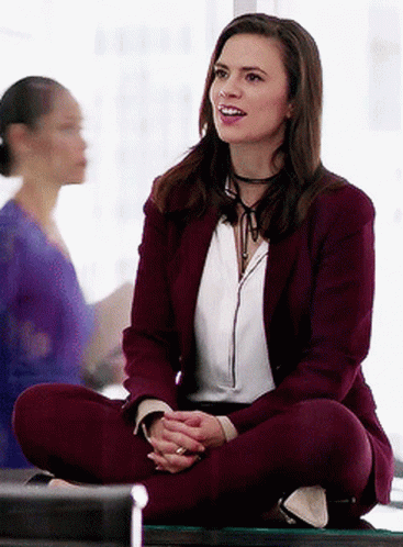 Hayley Atwell Gayly Talking Sitting On Table GIF