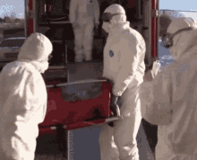 Hazmat Suit Men Carrying Body Fail GIF