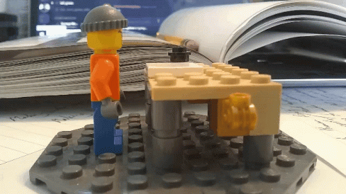 Head Desk Lego Man GIF