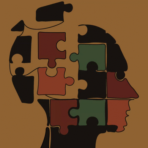 Head Made Of Jigsaw Puzzle Pieces GIF