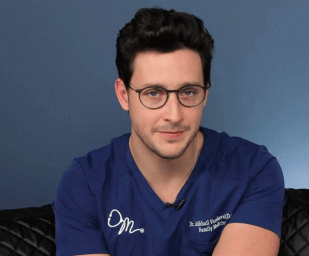 Head Shake By A Handsome Man In Blue Shirt GIF