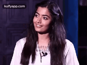 Head Shake With A Smile GIF