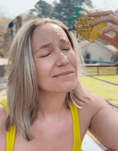 Head Tap Woman Holding Small Crown GIF