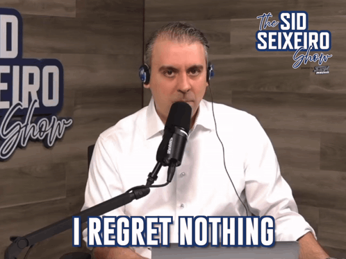 Headphones Man Saying I Regret Nothing on Mic