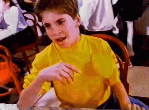 Heart Beating Boy In Yellow Shirt GIF