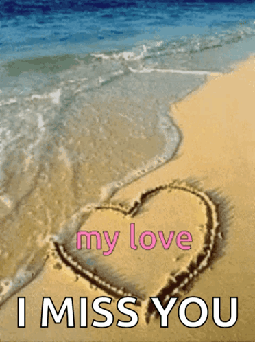 Heart Drawn in Sand with Miss You