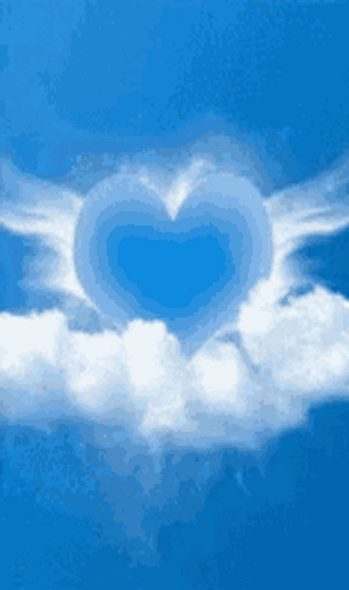 Heart Shape Clouds In Blue Sky GIF
