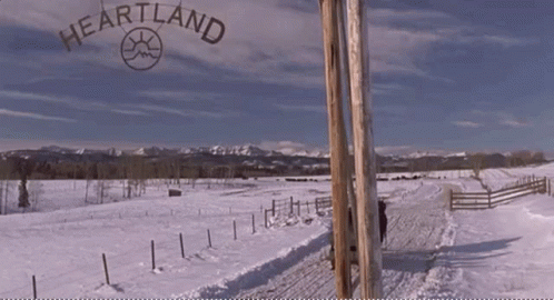 Heartland Sign Over Snowy Field GIF