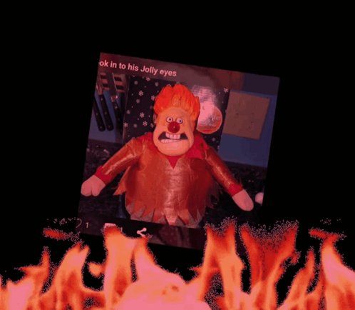 Heat Miser Doll With Fire Filter GIF