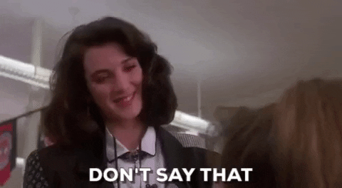Heathers Winona Ryder Flattered Smile GIF