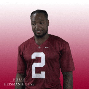 Heisman House Earl Campbell Awkward Stare GIF