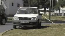 Helen Keller Driving Using White Cane GIF