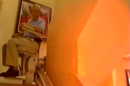 Hell Fire Baby Boomer Riding Stair Lift GIF