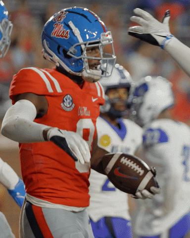 Helmet Tap Hug Ole Miss Rebels GIF