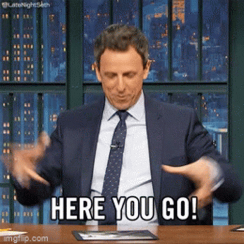 Here You Go Seth Meyers Handgun Meme GIF