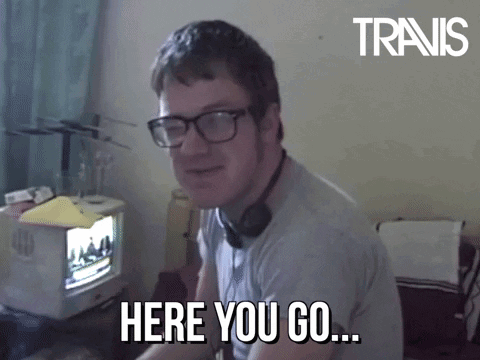 Here You Go Travis Handing Out L GIF