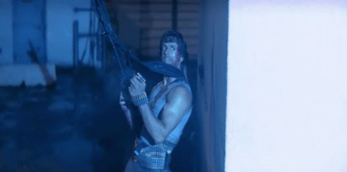 Hiding Rambo Machine Gun GIF