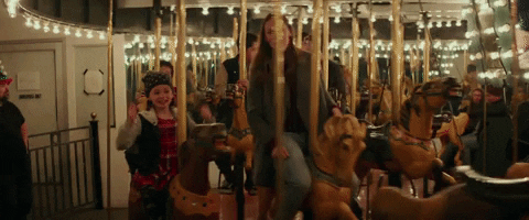 High Five On Merry Go Round GIF