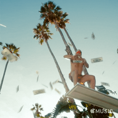 High Roller On Palm Tree Tossing Money GIF