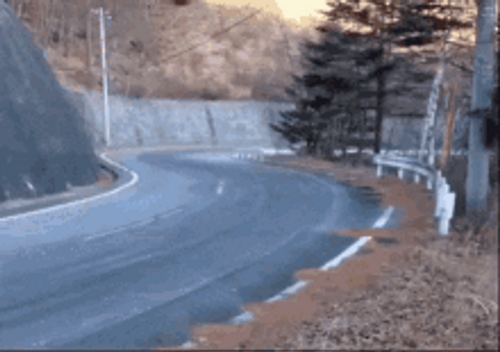 High Speed Car Drifting On Snaky Road GIF
