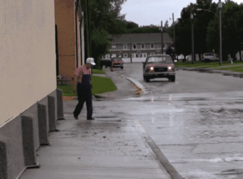 Hilarious Man Car Water Splash GIF