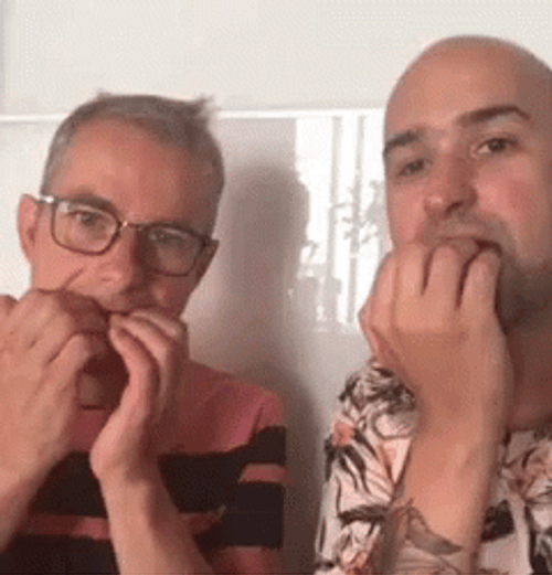 Hilarious Men Looking Nail Biting GIF
