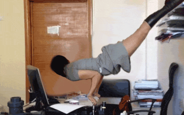 Hilarious Office Worker Exhibition Pretending To Work GIF