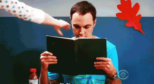 Hilarious Sheldon Reading Pretending To Work GIF