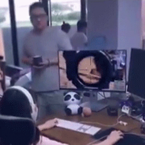 Hilarious Worker Playing Games Pretending To Work GIF