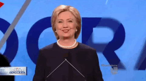 Hillary Clinton Raising Her Arms Halfway GIF