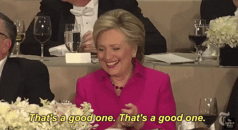 Hillary Clinton Sitting In A Table GIF