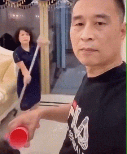 Hit The Broom On The Face GIF