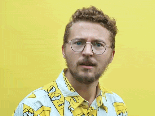 Hmph Guy Wearing Simpsons Shirt GIF