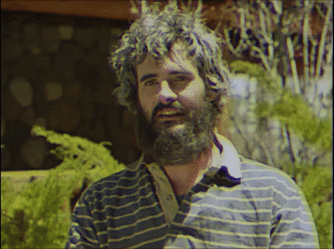 Hobo Using Polaroid Camera GIF