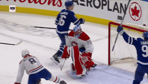 Hockey Game In Front Of Airplane Banner GIF