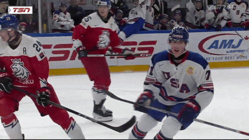 Hockey Game in Front of AMJ Ad