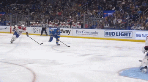 Hockey Game in Front of Bud Light Ad
