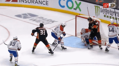 Hockey Game In Front Of Cox Ad GIF