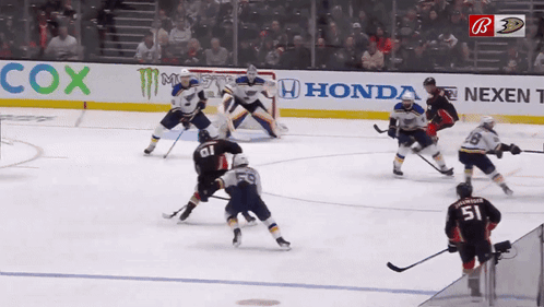 Hockey Game in Front of Cox Ad