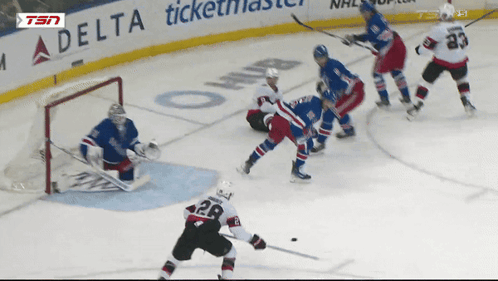 Hockey Game In Front Of Delta Ticketmaster Sign GIF