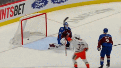 Hockey Game In Front Of Ford Ad GIF