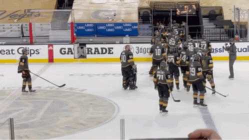 Hockey Game in Front of Ga Trade Ad