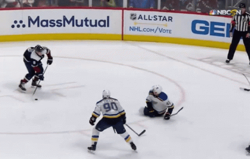 Hockey Game in Front of Geico Sign