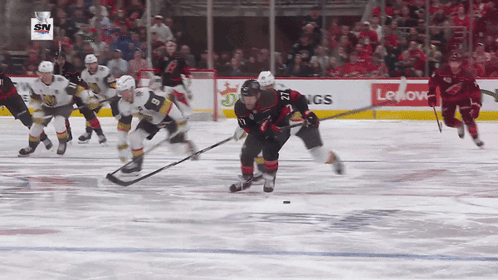 Hockey Game In Front Of Lenovo Advertisement GIF