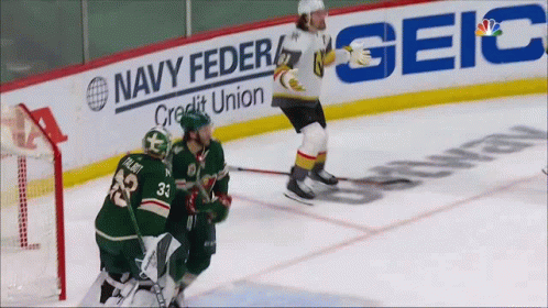 Hockey Game in Front of Navy Federal Credit Union Ad